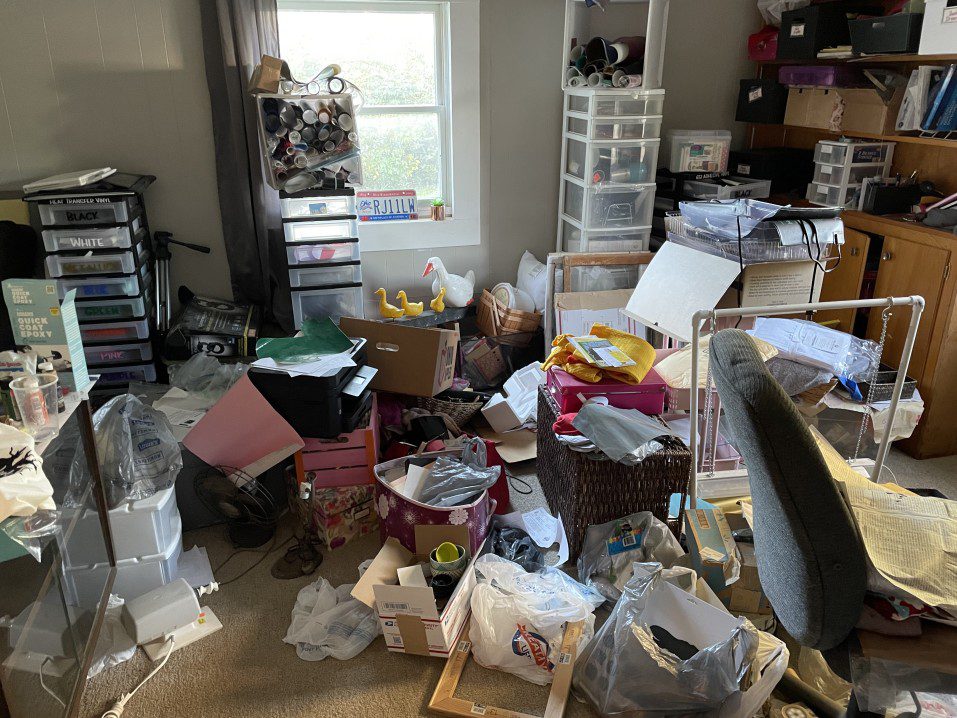 messy hoarder house with objects strewed everywhere